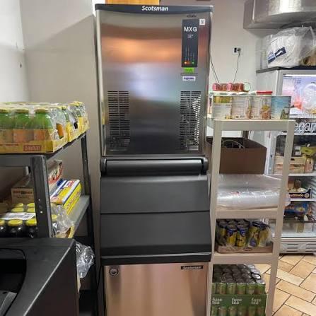 Light commercial ice machine being descaled in a Utah office.
